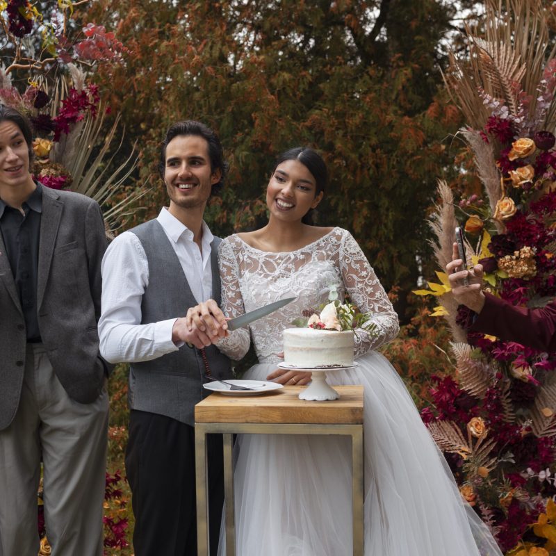 front-view-smiley-groom-bride
